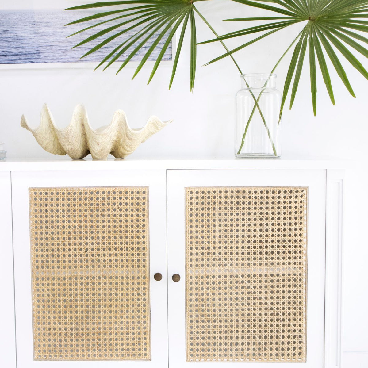Whitsunday white four-door sideboard with rattan inserts, close-up of the doors in a coastal living room