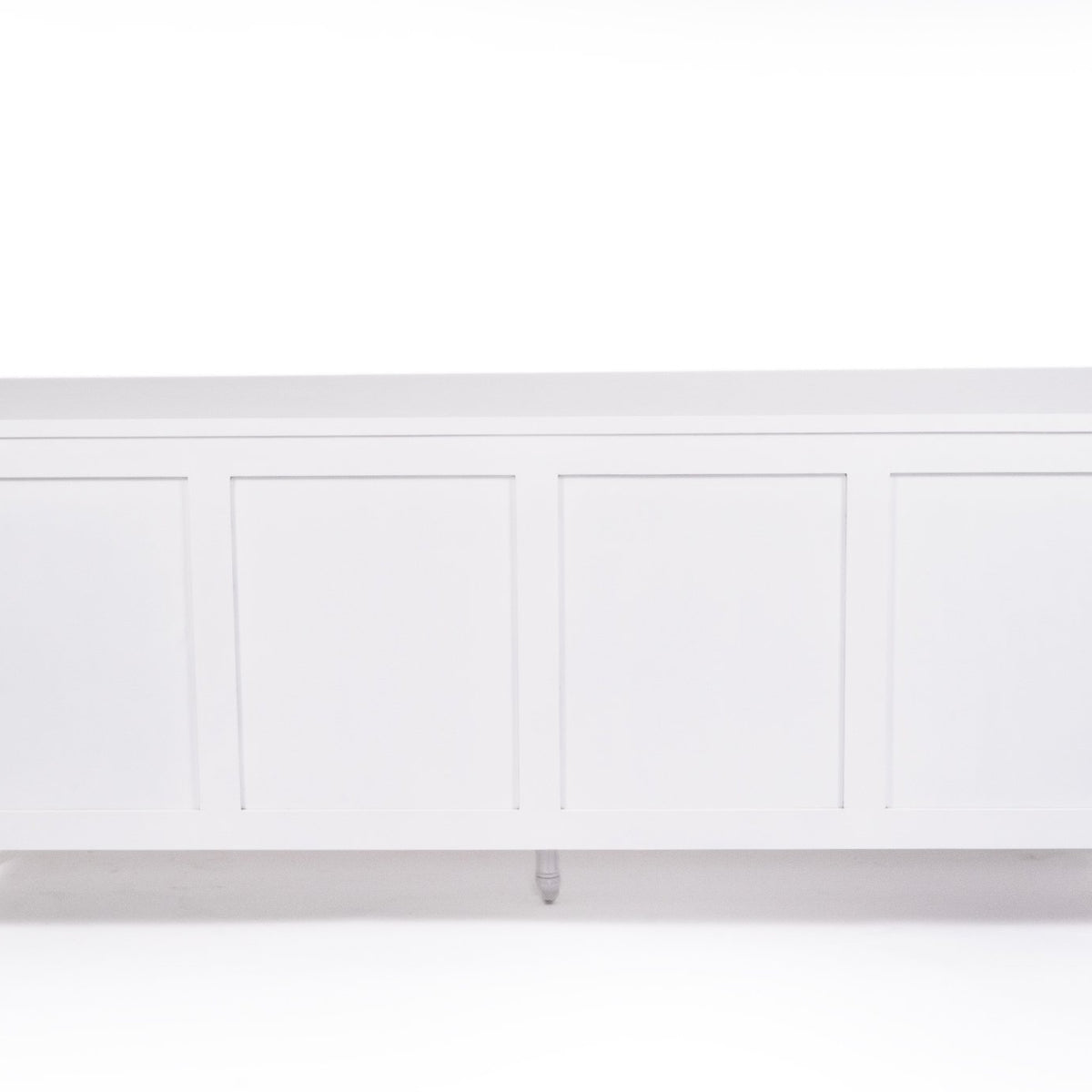 Whitsunday white four-door sideboard with rattan inserts, rear view showing the back panels